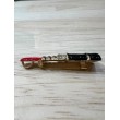 Broche rouge à lèvres